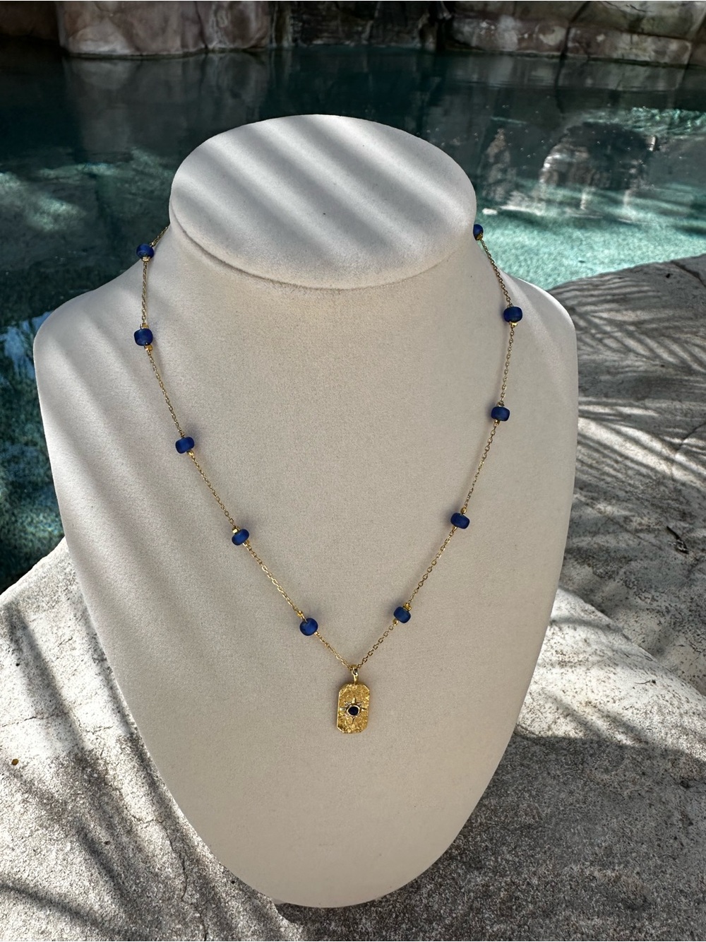 Gold Necklace with Blue Beads and Pendant